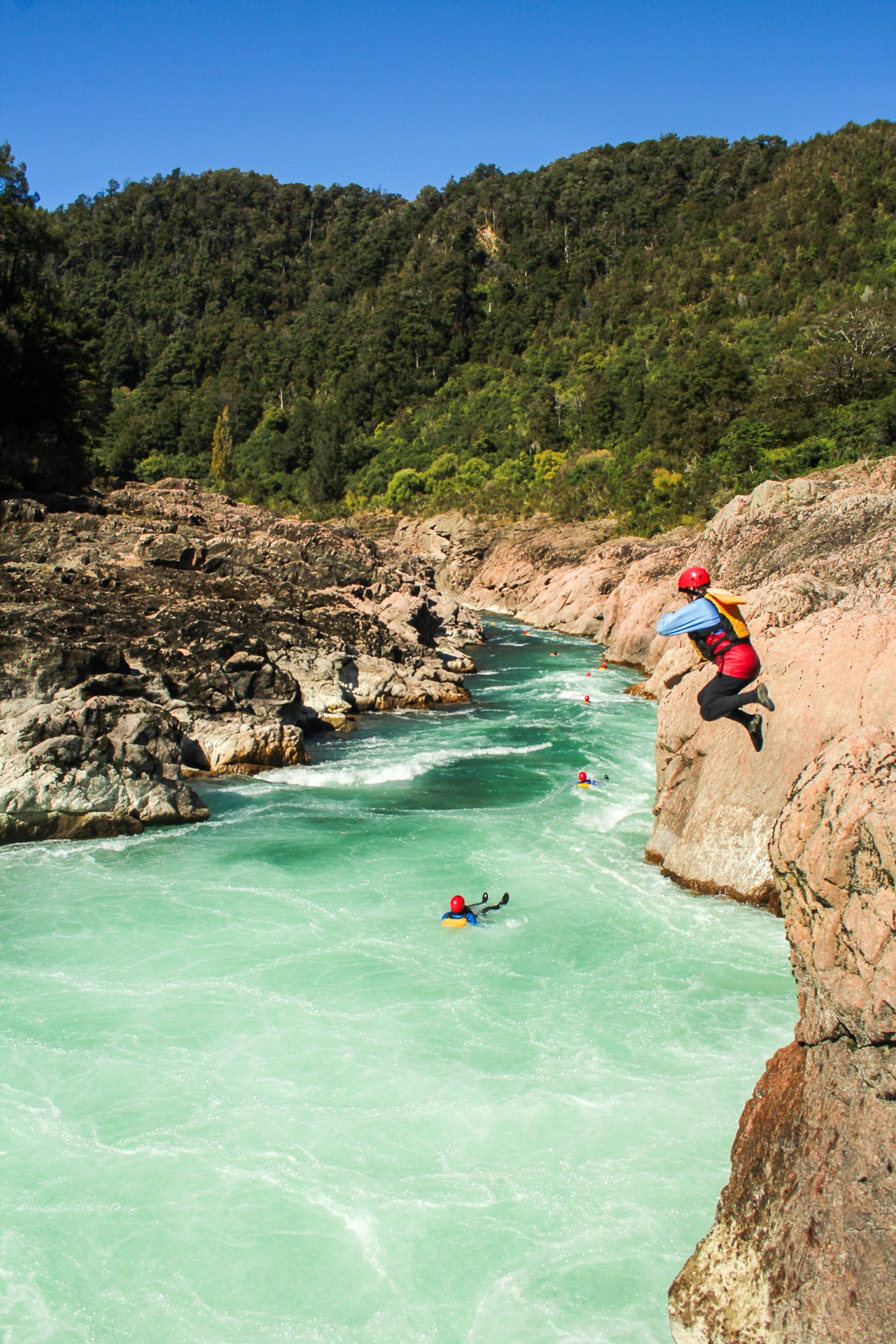 Team celebrating successful rapids run